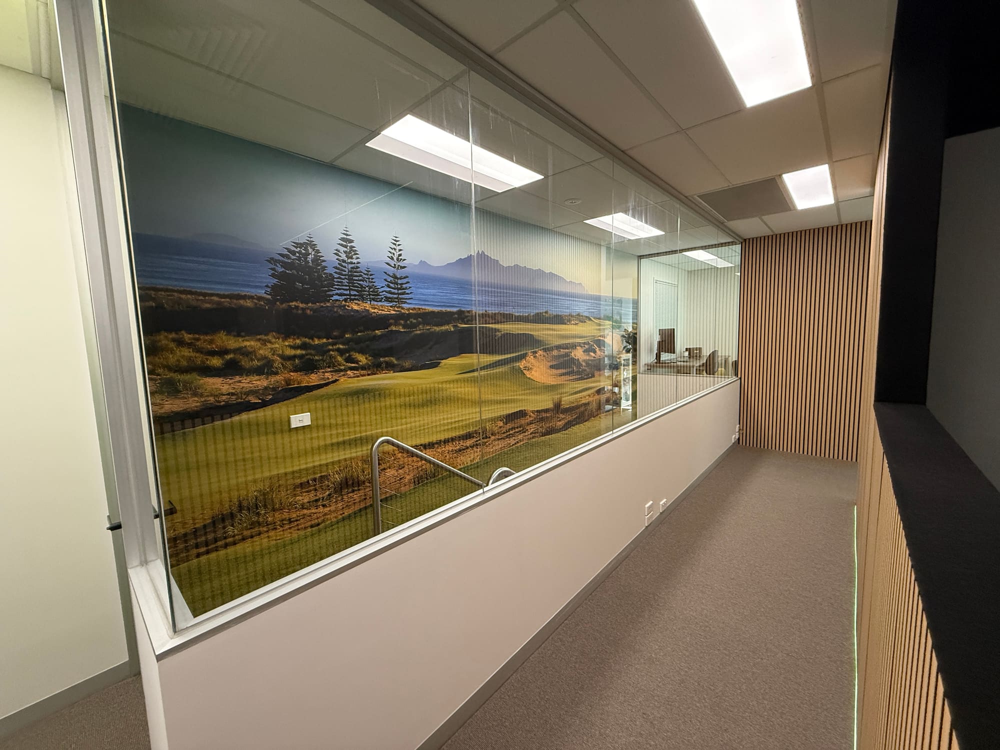 Golf-inspired interior walkway connecting spaces inside Golfers Hub