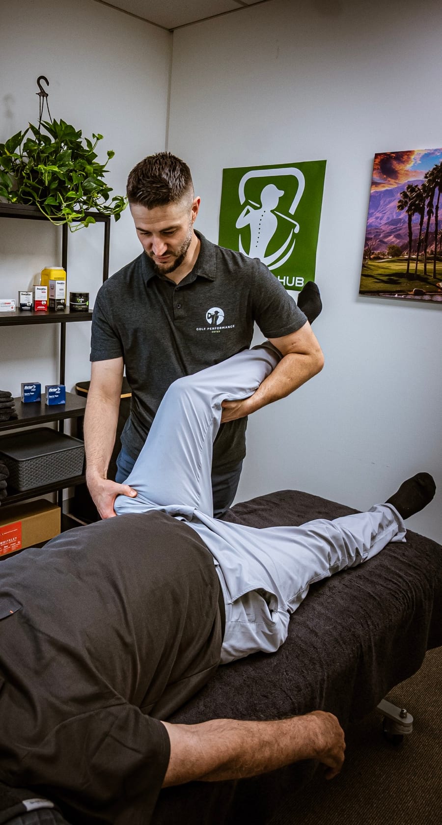 Jon Zuccala providing osteopathic treatment in the private Golfers Hub treatment room
